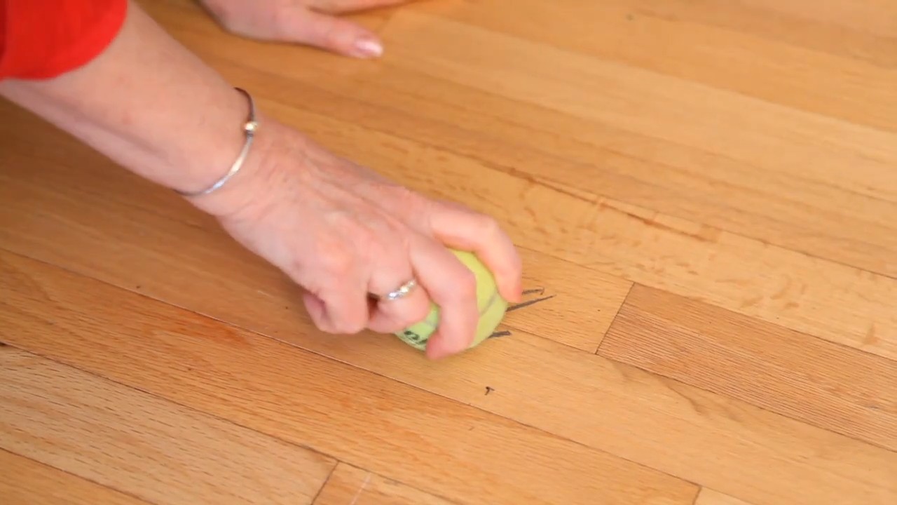 Tennis ball scuff mark removal